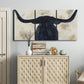 Three-panel canvas wall art featuring rustic animal portrait illustration, displayed above a cabinet in an entryway.