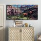 Three-panel canvas wall art featuring classic canyon landscape scene, displayed above a cabinet in an entryway.