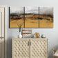 Three-panel canvas wall art featuring abstract bridge landscape in ochre, displayed above a cabinet in an entryway.
