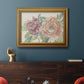 Modern peony floral drawing in an ornate traditional gold frame displayed in a dark-toned interior setting.