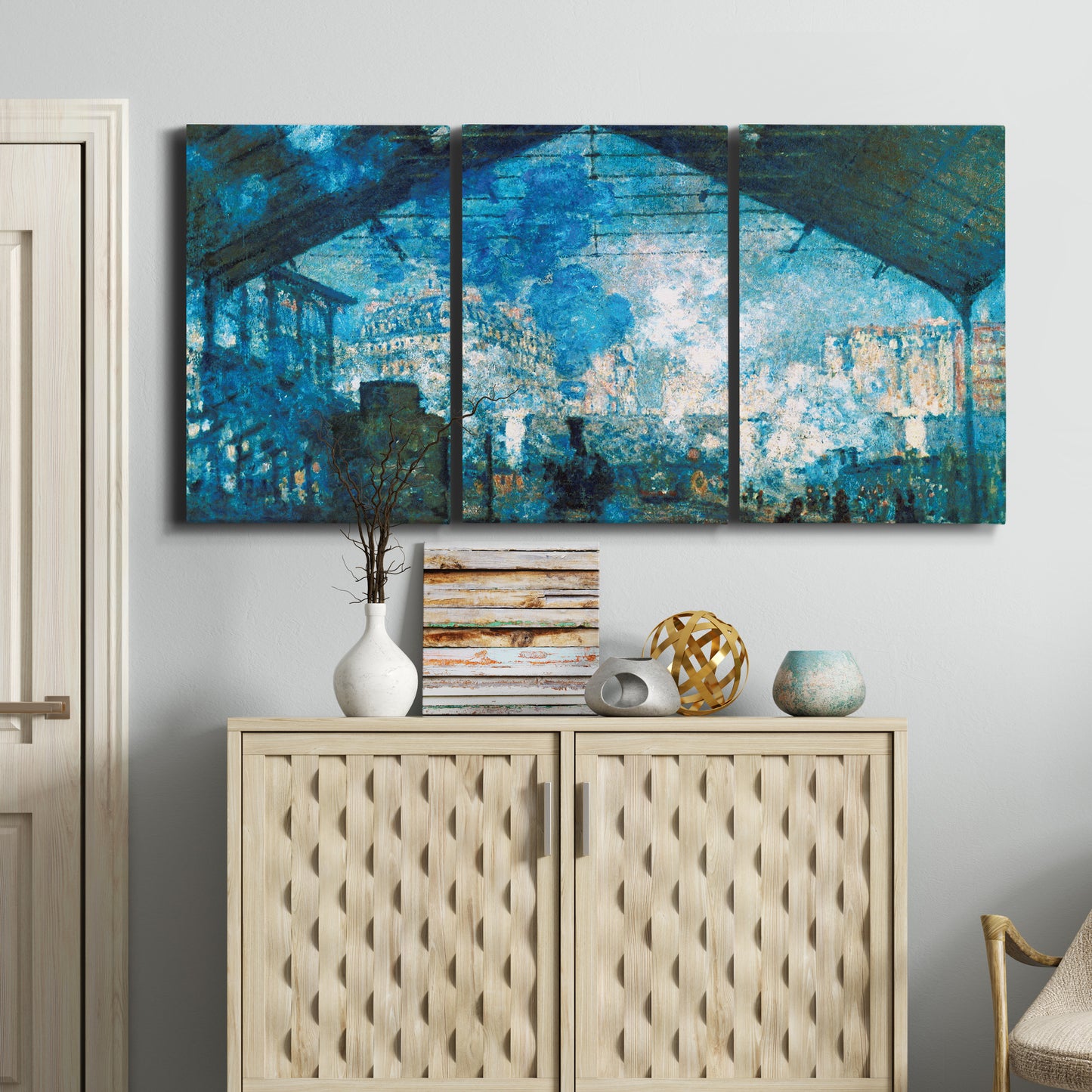 Three-panel canvas wall art featuring railway station filled with steam, displayed above a cabinet in an entryway.