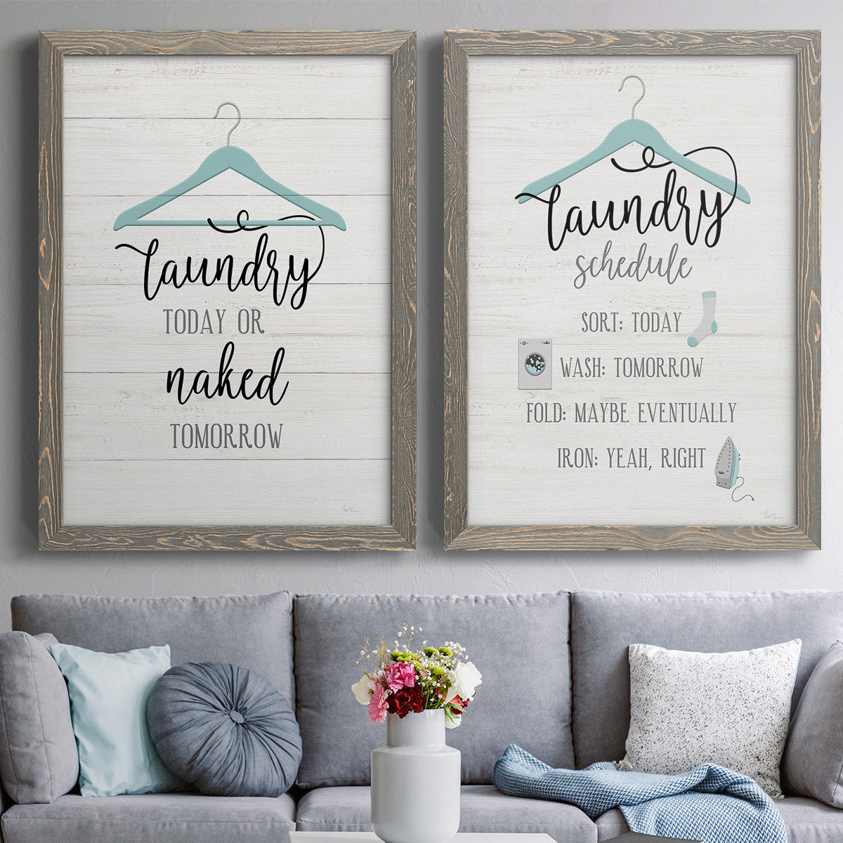 Set of two gray barnwood framed canvas prints depicting paired rustic typographic wall art with hand-lettered phrases, socks hangers and laundry symbols on linen texture above a sofa in a contemporary living room.
