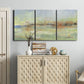 Three-panel canvas wall art featuring layered abstract transitional textures, displayed above a cabinet in an entryway.