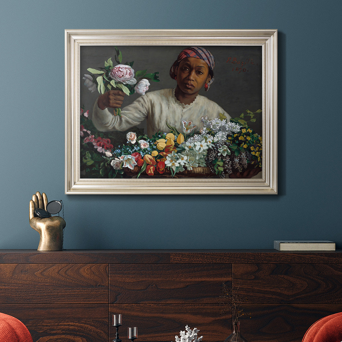 Traditional portrait of a woman holding peonies by Frédéric Bazille in an ornate champagne frame displayed in a dark-toned interior setting.