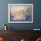 Impressionist Mediterranean harbor painting by Paul Signac in an ornate weathered white frame displayed in a dark-toned interior setting.