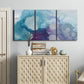 Three-panel canvas wall art featuring icy abstract crystalline forms, displayed above a cabinet in an entryway.