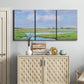 Three-panel canvas wall art featuring summer marshland with tall grasses, displayed above a cabinet in an entryway.