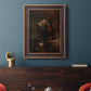 Classical religious portrait of Paul the Apostle by Rembrandt van Rijn in an ornate bronzed mahogany wood frame displayed in a dark-toned interior setting.
