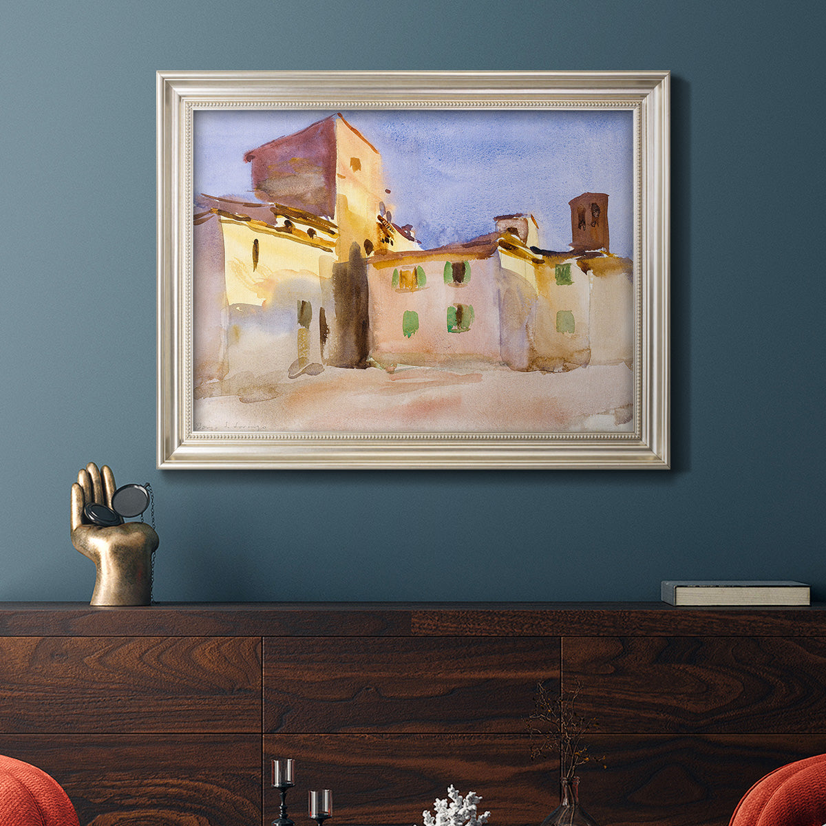 Impressionist Italian village scene by John Singer Sargent in an ornate champagne frame displayed in a dark-toned interior setting.