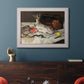 Impressionist still life painting of fish by Édouard Manet in an ornate weathered white frame displayed in a dark-toned interior setting.