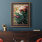 Impressionist garden floral painting by Gustave Caillebotte in an ornate bronzed mahogany wood frame displayed in a dark-toned interior setting.