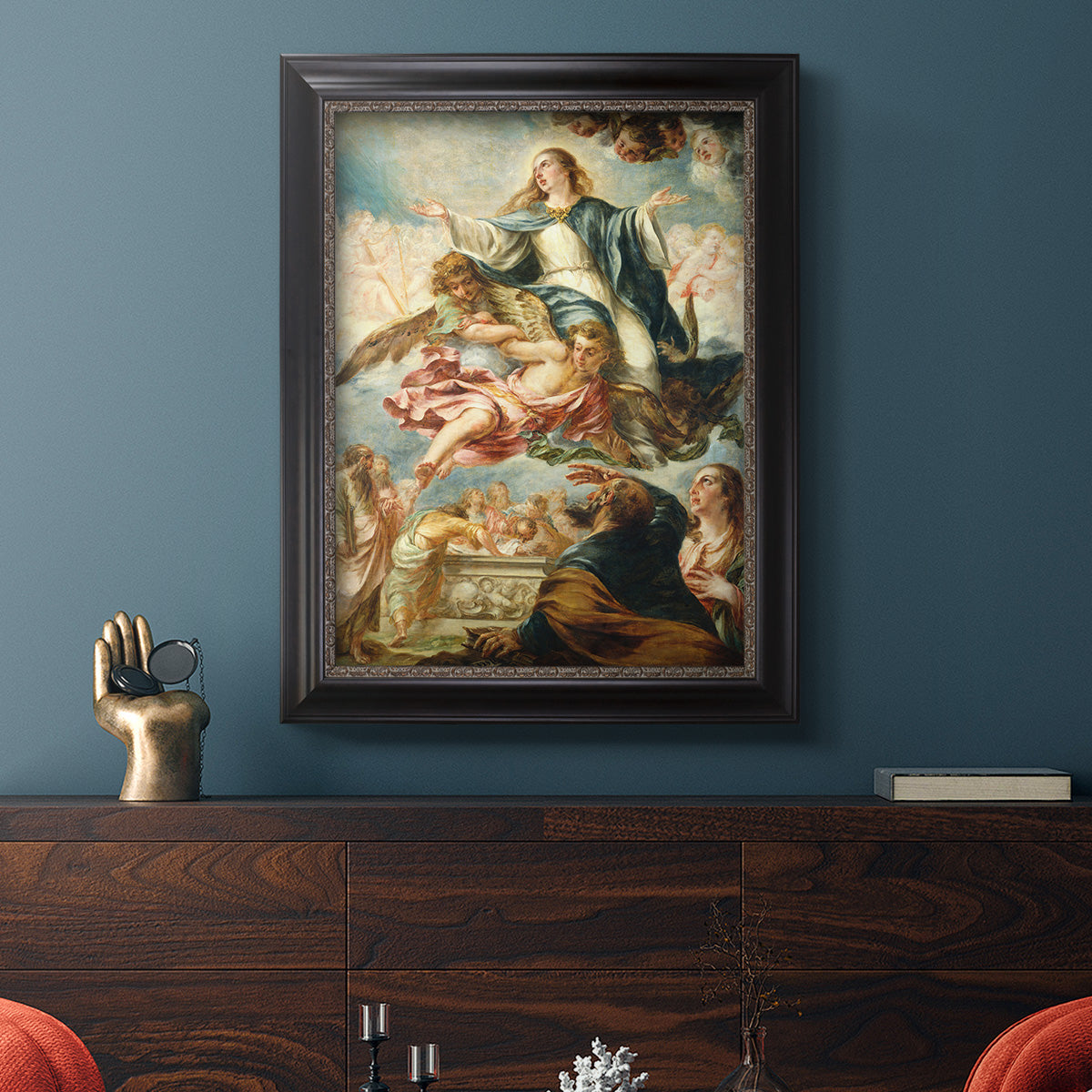Religious painting of the Assumption of the Virgin Mary by Juan de Valdés Leal in an ornate black frame with gilded inner detail displayed in a dark-toned interior setting.