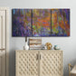Three-panel canvas wall art featuring abstract rainfall with butterfly forms, displayed above a cabinet in an entryway.