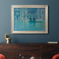 Impressionist Venetian palace waterfront scene by Claude Monet in an ornate champagne frame displayed in a dark-toned interior setting.