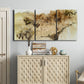Three-panel canvas wall art featuring muted abstract with metallic gold accents, displayed above a cabinet in an entryway.