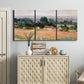 Three-panel canvas wall art featuring haystacks arranged in rural field, displayed above a cabinet in an entryway.