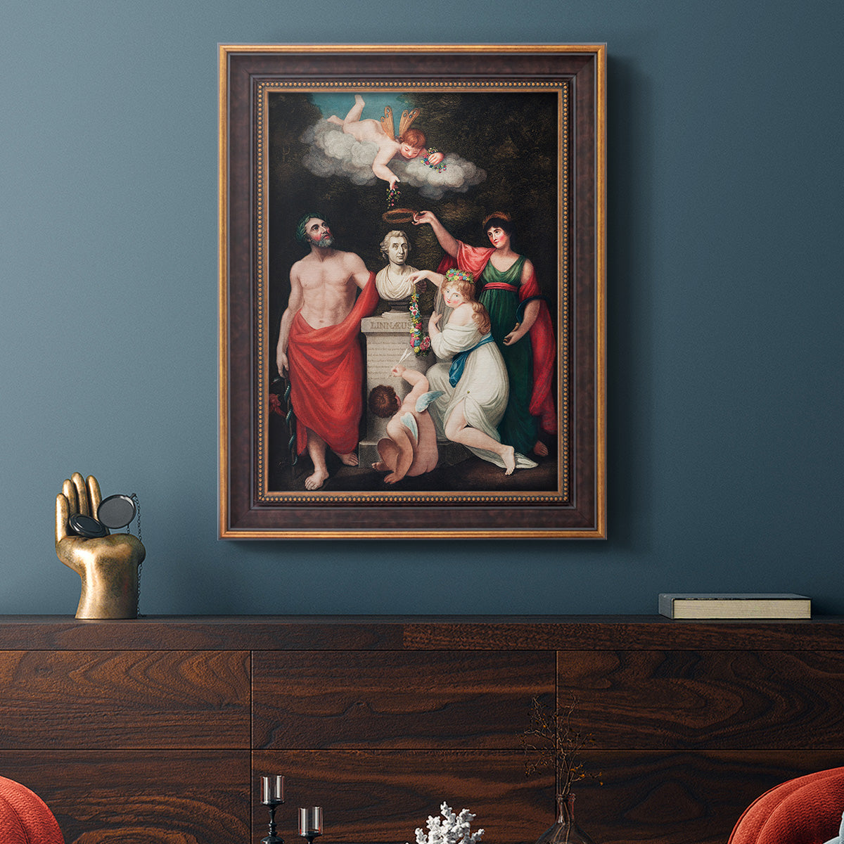 Classical allegorical painting honoring Linnaeus by Robert John Thornton in an ornate bronzed mahogany wood frame displayed in a dark-toned interior setting.