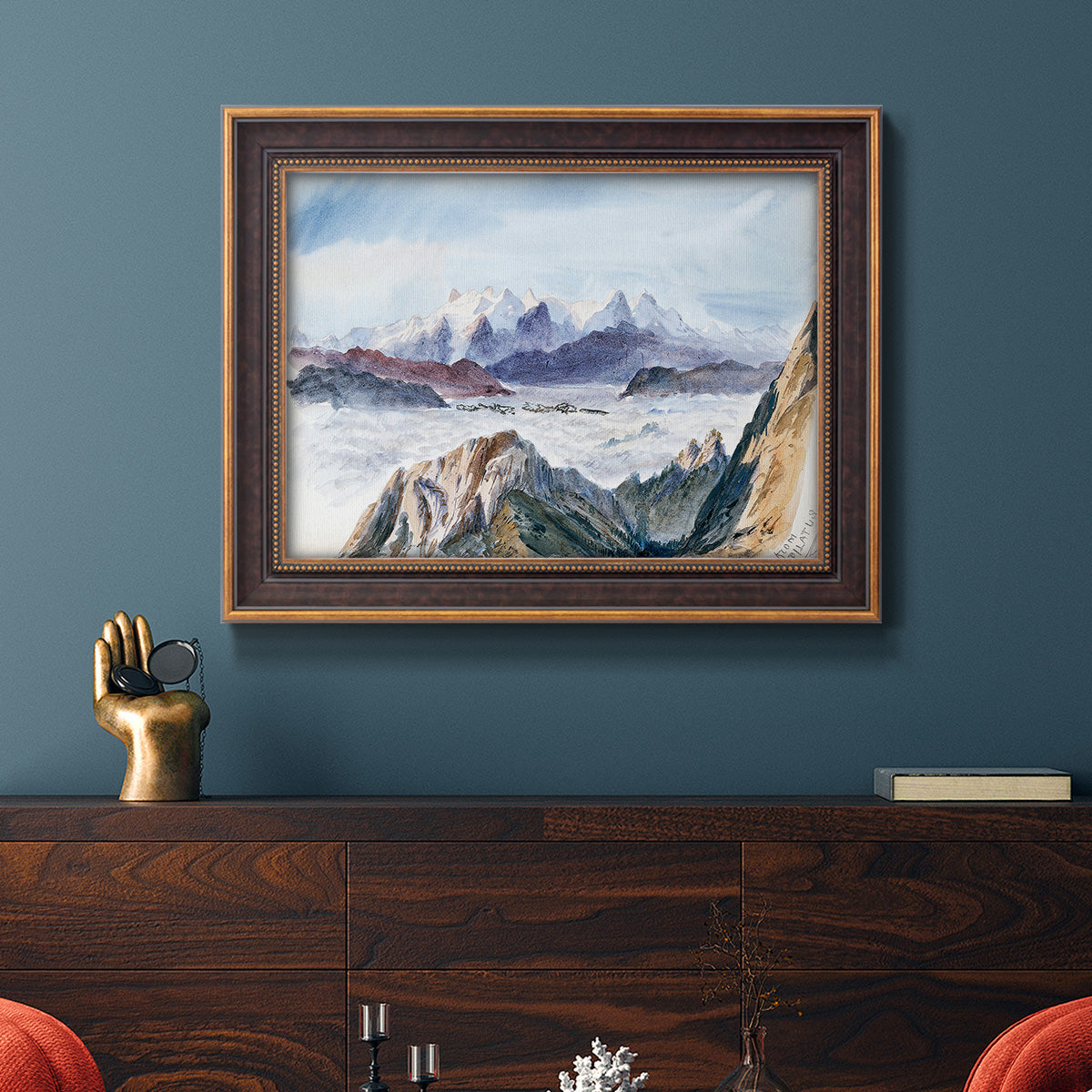 Impressionist alpine mountain landscape by John Singer Sargent in an ornate bronzed mahogany wood frame displayed in a dark-toned interior setting.