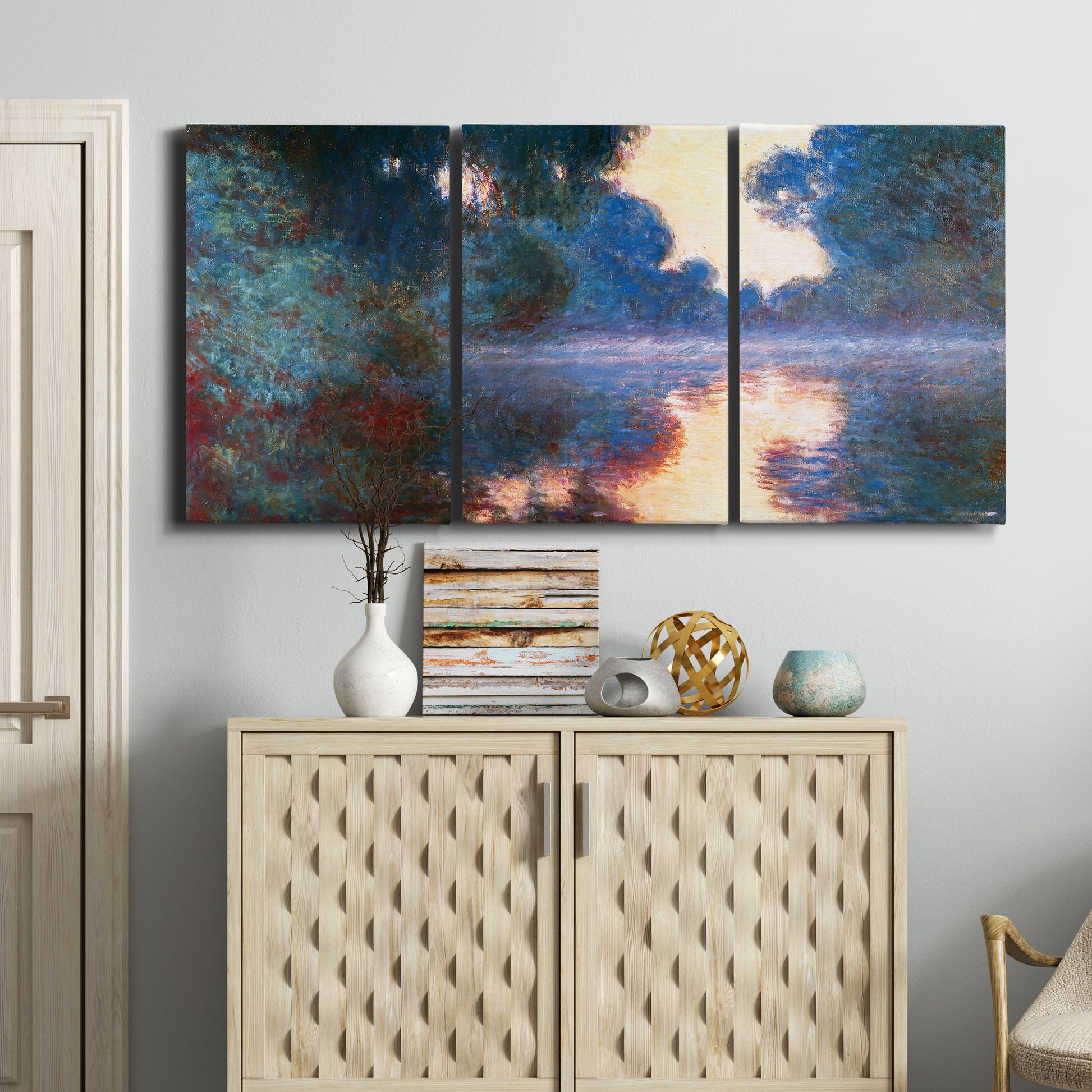 Three-panel canvas wall art featuring misty river surface at dawn, displayed above a cabinet in an entryway.