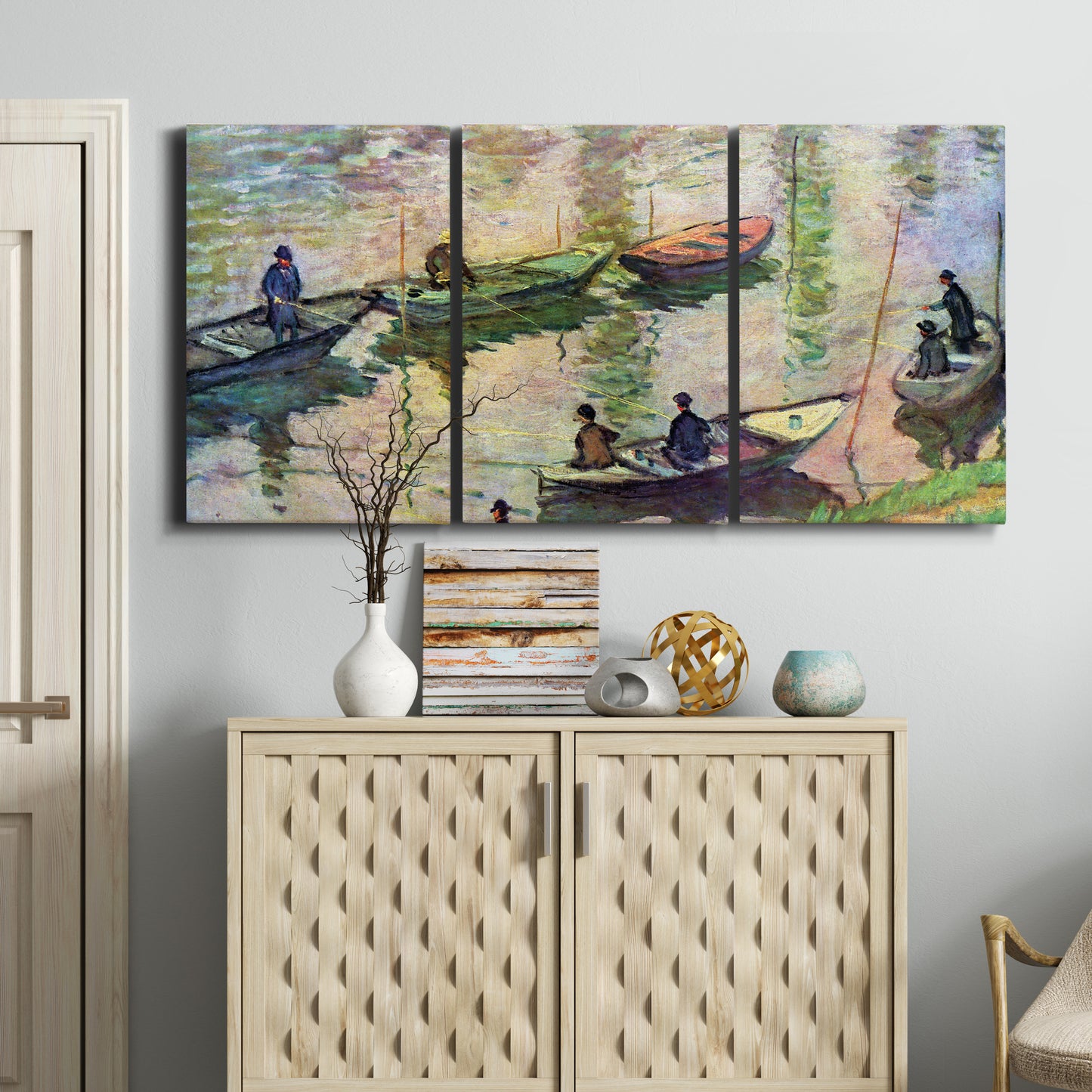 Three-panel canvas wall art featuring river scene with boats and reflections, displayed above a cabinet in an entryway.