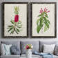 Set of two black barnwood framed canvas prints depicting paired vintage botanical plate illustrations with peonies thistles leafy stems and archival cream paper above a sofa in a contemporary living room.