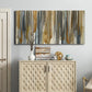 Three-panel canvas wall art featuring abstract vertical illusion pattern, displayed above a cabinet in an entryway.