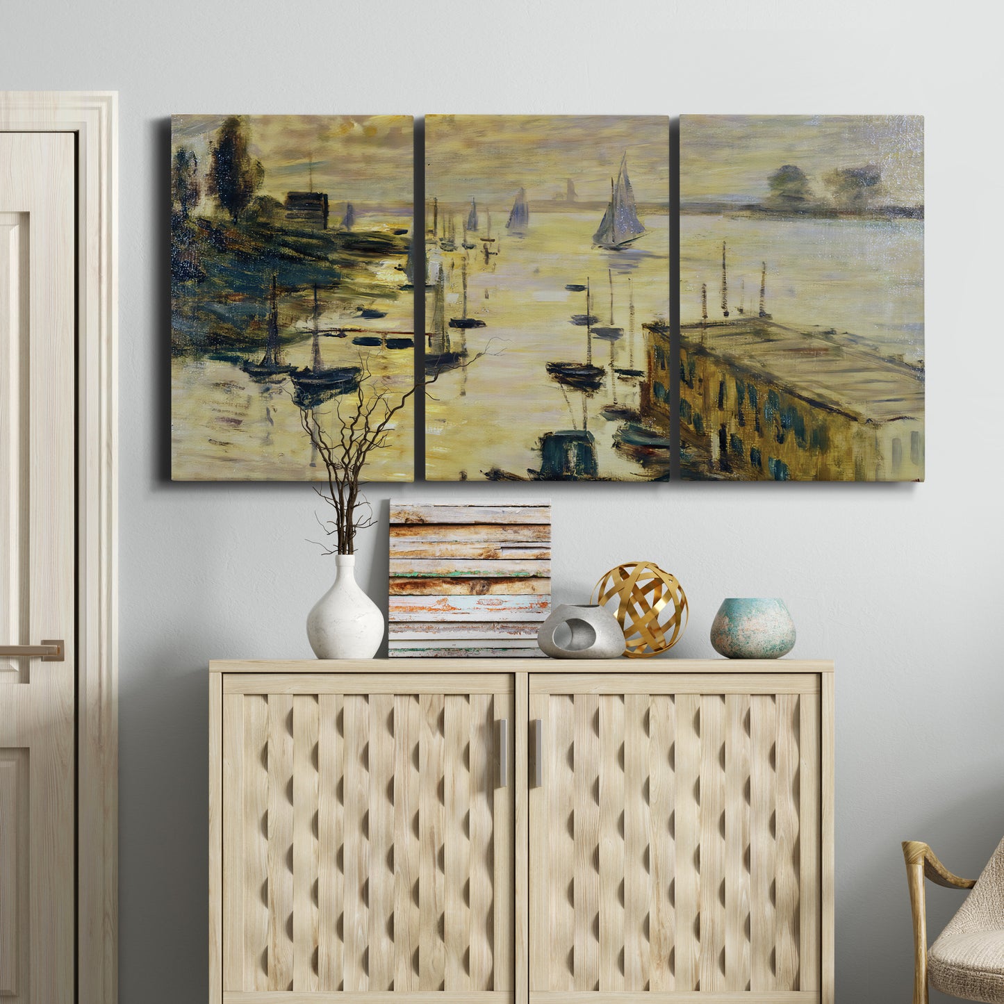 Three-panel canvas wall art featuring working harbor with boats, displayed above a cabinet in an entryway.