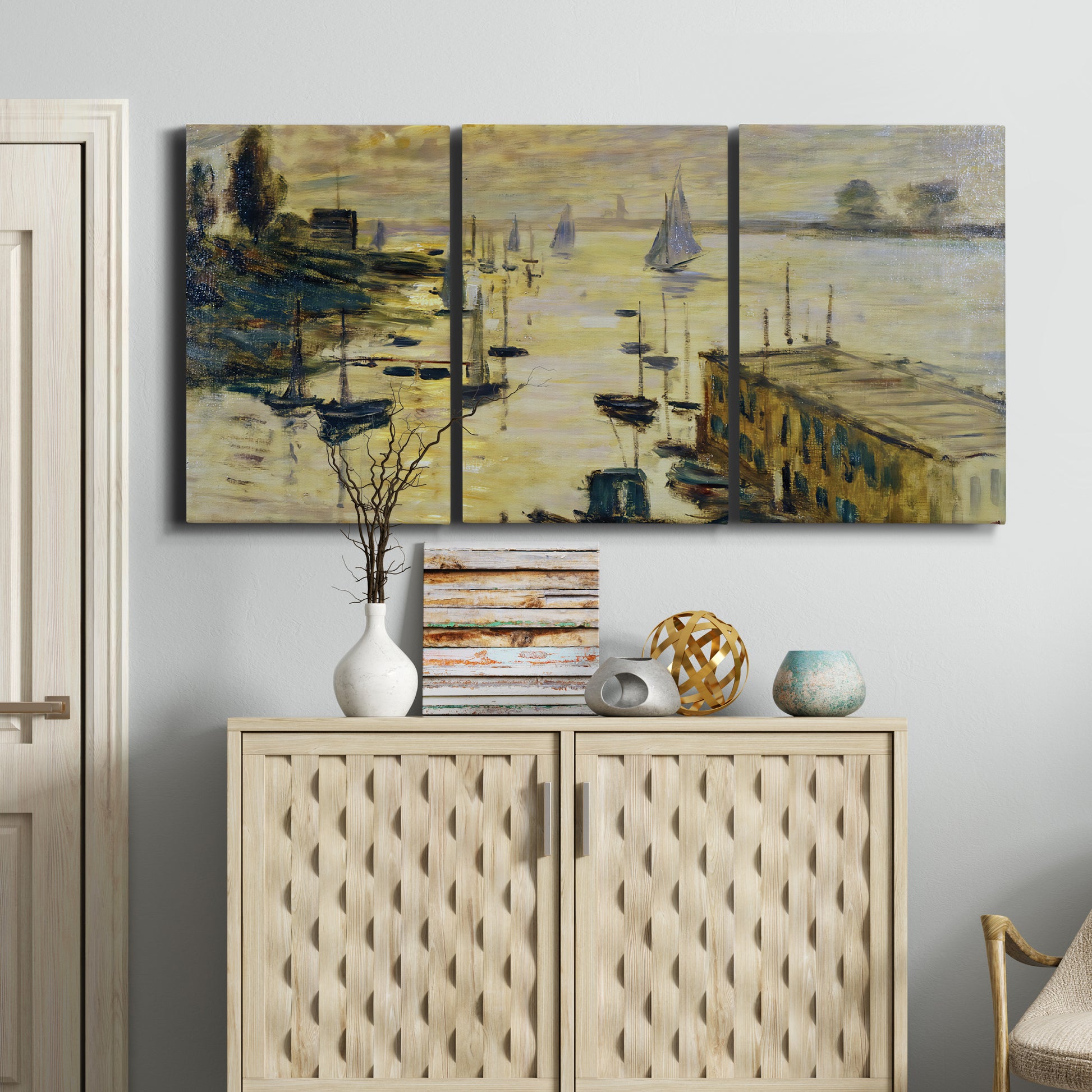 Three-panel canvas wall art featuring working harbor with boats, displayed above a cabinet in an entryway.