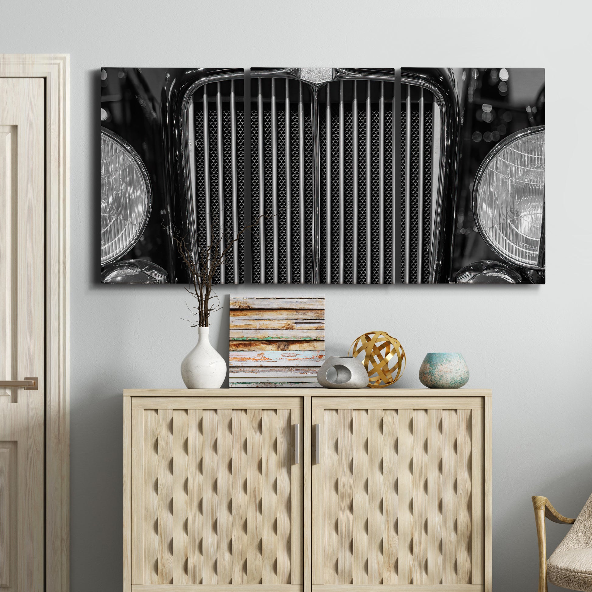 Three-panel canvas wall art featuring vintage car grille detail, displayed above a cabinet in an entryway.