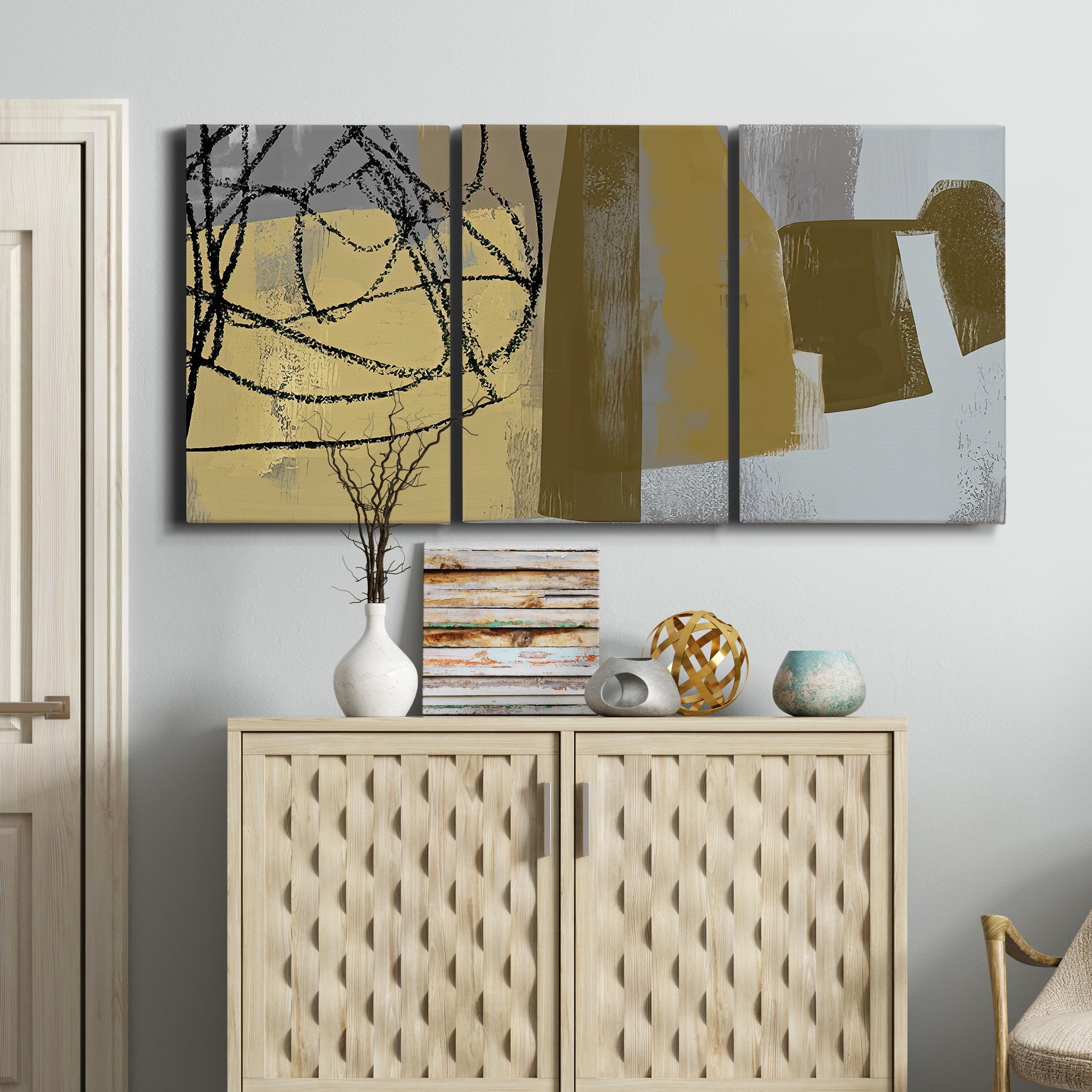 Three-panel canvas wall art featuring industrial abstract digital glitch pattern, displayed above a cabinet in an entryway.