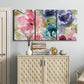 Three-panel canvas wall art featuring soft floral watercolor composition, displayed above a cabinet in an entryway.