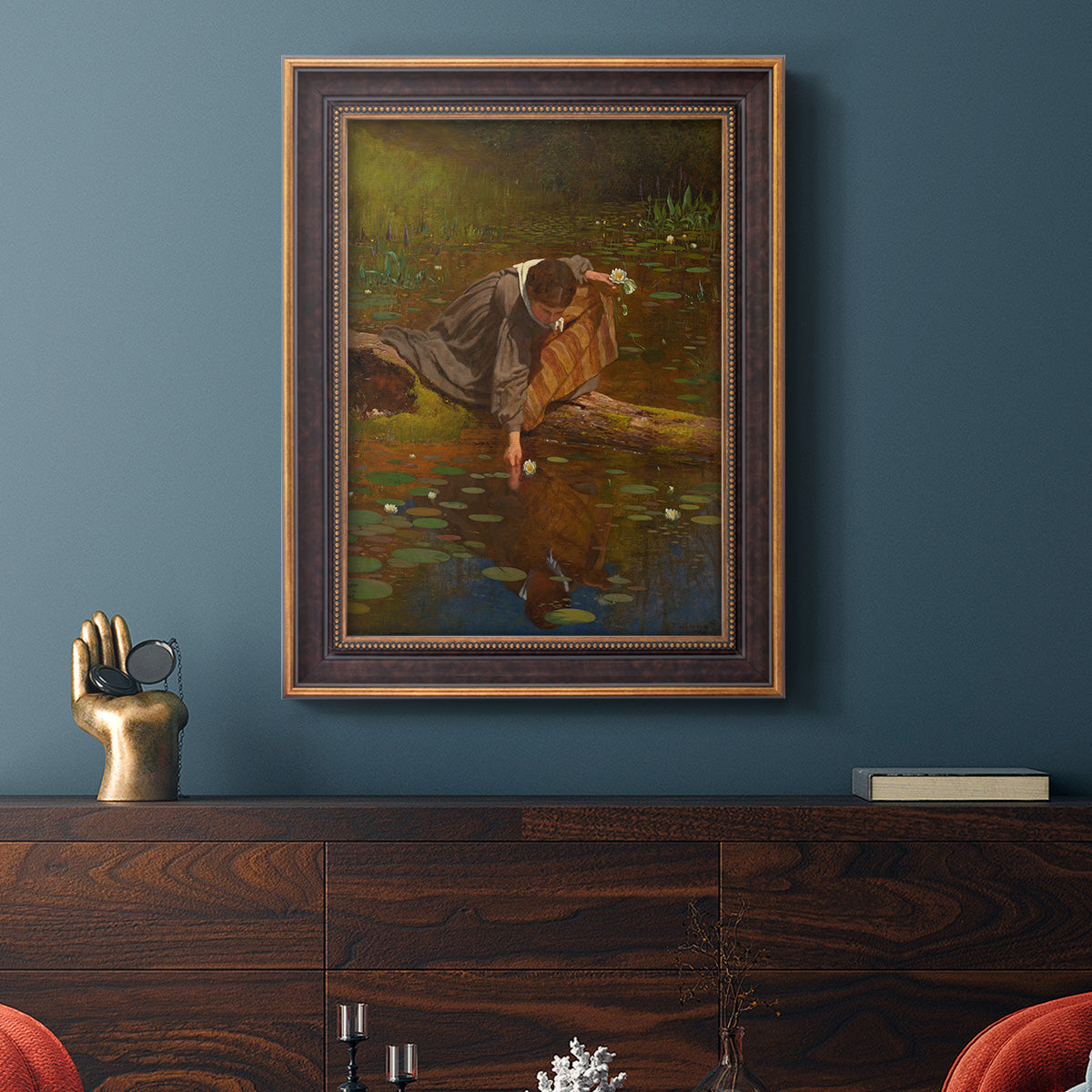 Realist genre painting of figures gathering lilies by Eastman Johnson in an ornate bronzed mahogany wood frame displayed in a dark-toned interior setting.