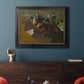 Impressionist cabaret interior scene by Henri de Toulouse-Lautrec in an ornate black frame with gilded inner detail displayed in a dark-toned interior setting.