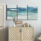 Three-panel canvas wall art featuring minimalist ultramarine abstract vista, displayed above a cabinet in an entryway.