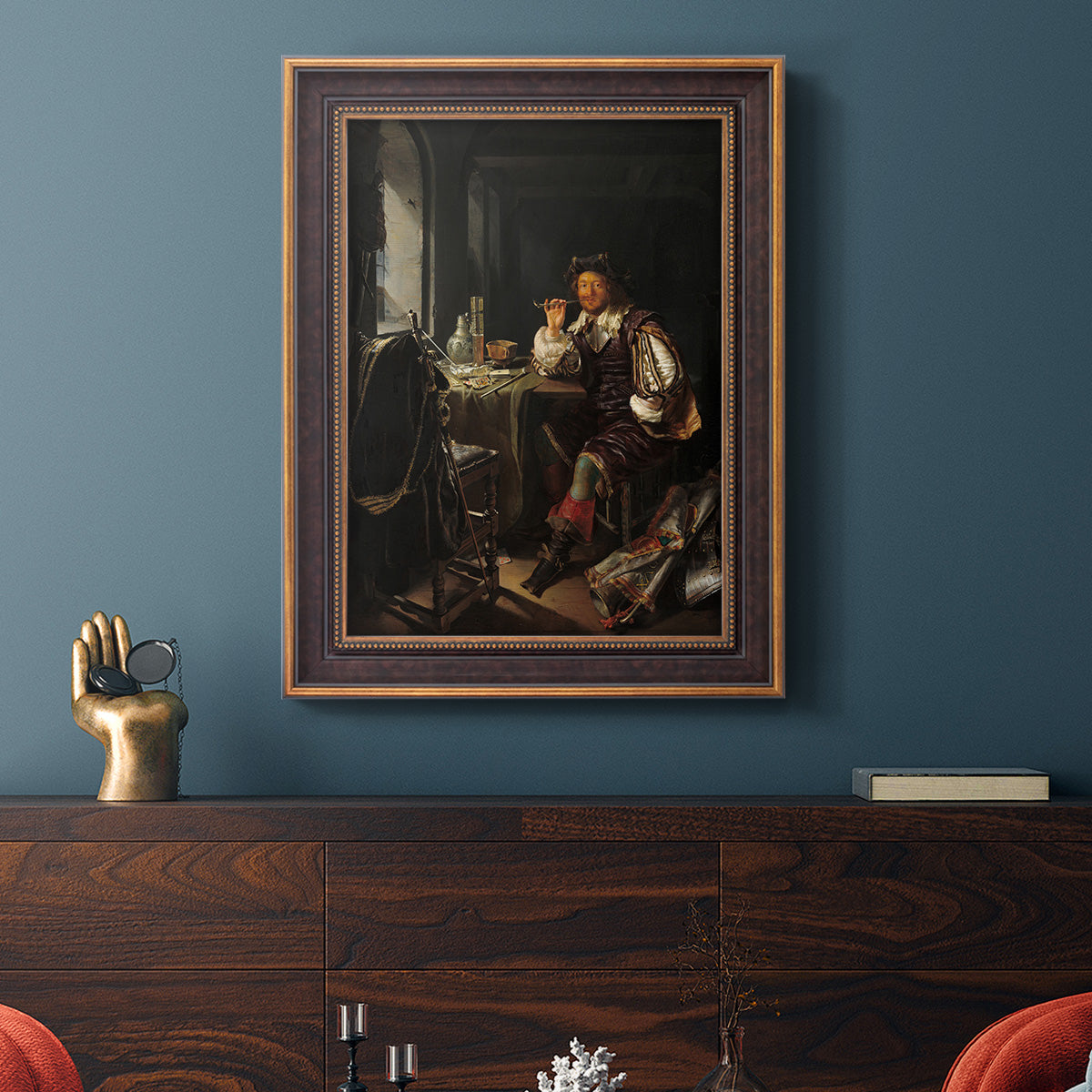 Classical portrait of a soldier smoking a pipe by Frans van Mieris the Elder in an ornate bronzed mahogany wood frame displayed in a dark-toned interior setting.