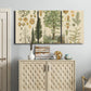 Three-panel canvas wall art featuring vintage floral botanical collage, displayed above a cabinet in an entryway.