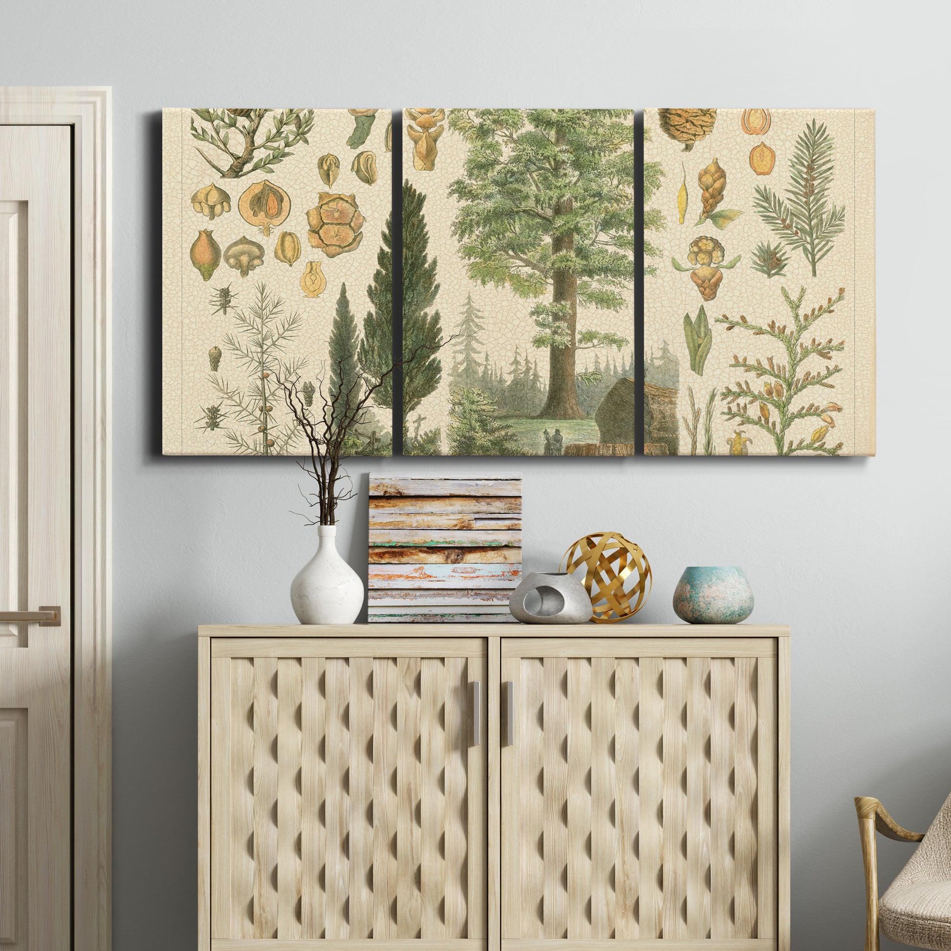 Three-panel canvas wall art featuring vintage floral botanical collage, displayed above a cabinet in an entryway.