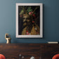 Surreal allegorical portrait representing the four seasons by Giuseppe Arcimboldo in an ornate weathered white frame displayed in a dark-toned interior setting.