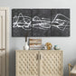 Three-panel canvas wall art featuring minimal abstract frequency lines, displayed above a cabinet in an entryway.