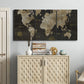Three-panel canvas wall art featuring illustrated safari world map, displayed above a cabinet in an entryway.