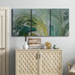 Three-panel canvas wall art featuring layered modern abstract landscape, displayed above a cabinet in an entryway.