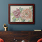 Modern peony floral drawing in an ornate cherry burl wood frame displayed in a dark-toned interior setting.