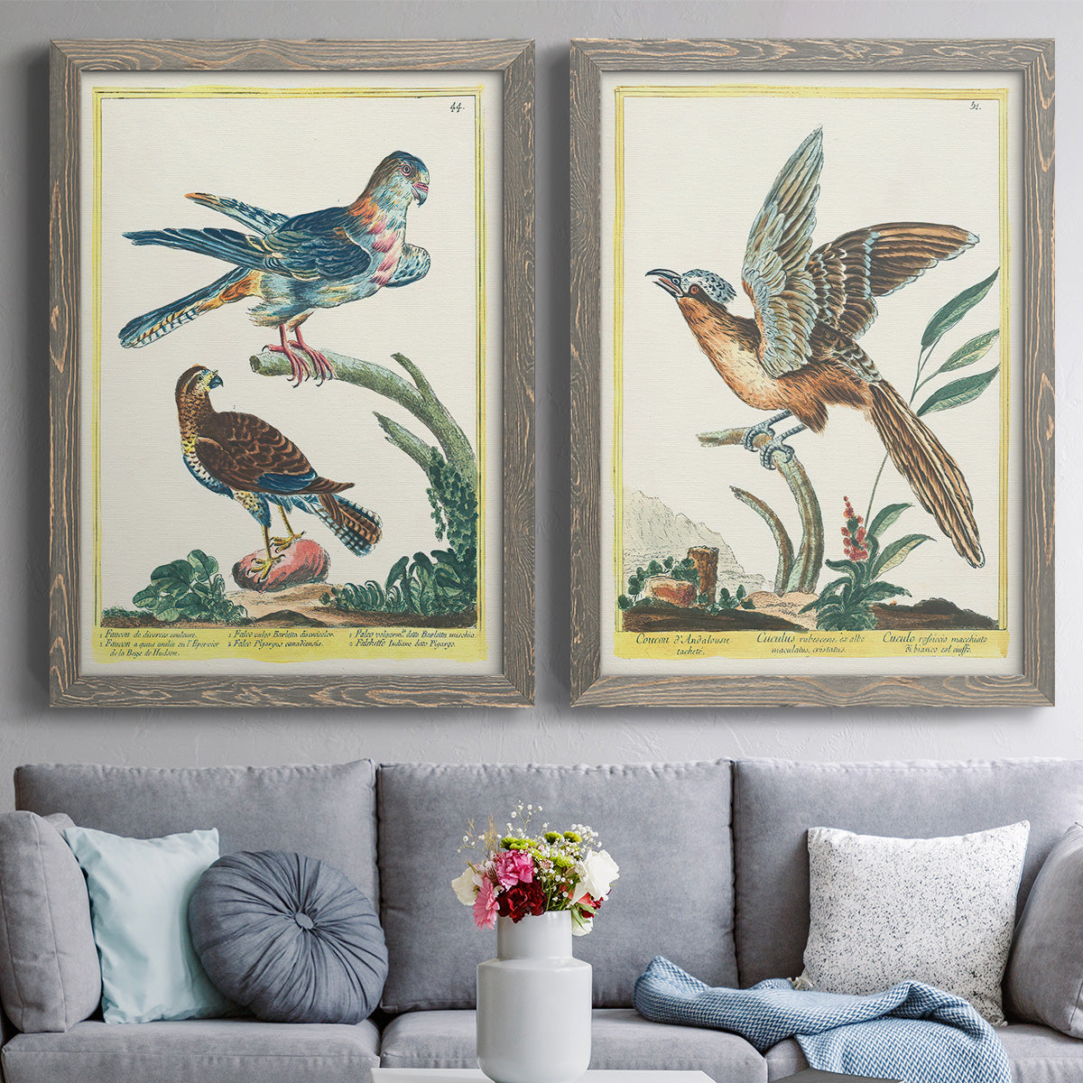 Set of two gray barnwood framed canvas prints depicting paired atmospheric abstract paintings with soft clustered strokes, hazy edges, and spacious white fields above a sofa in a contemporary living room.