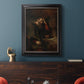 Classical religious portrait of Paul the Apostle by Rembrandt van Rijn in an ornate black frame with gilded inner detail displayed in a dark-toned interior setting.