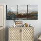 Three-panel canvas wall art featuring soft abstract evening light, displayed above a cabinet in an entryway.