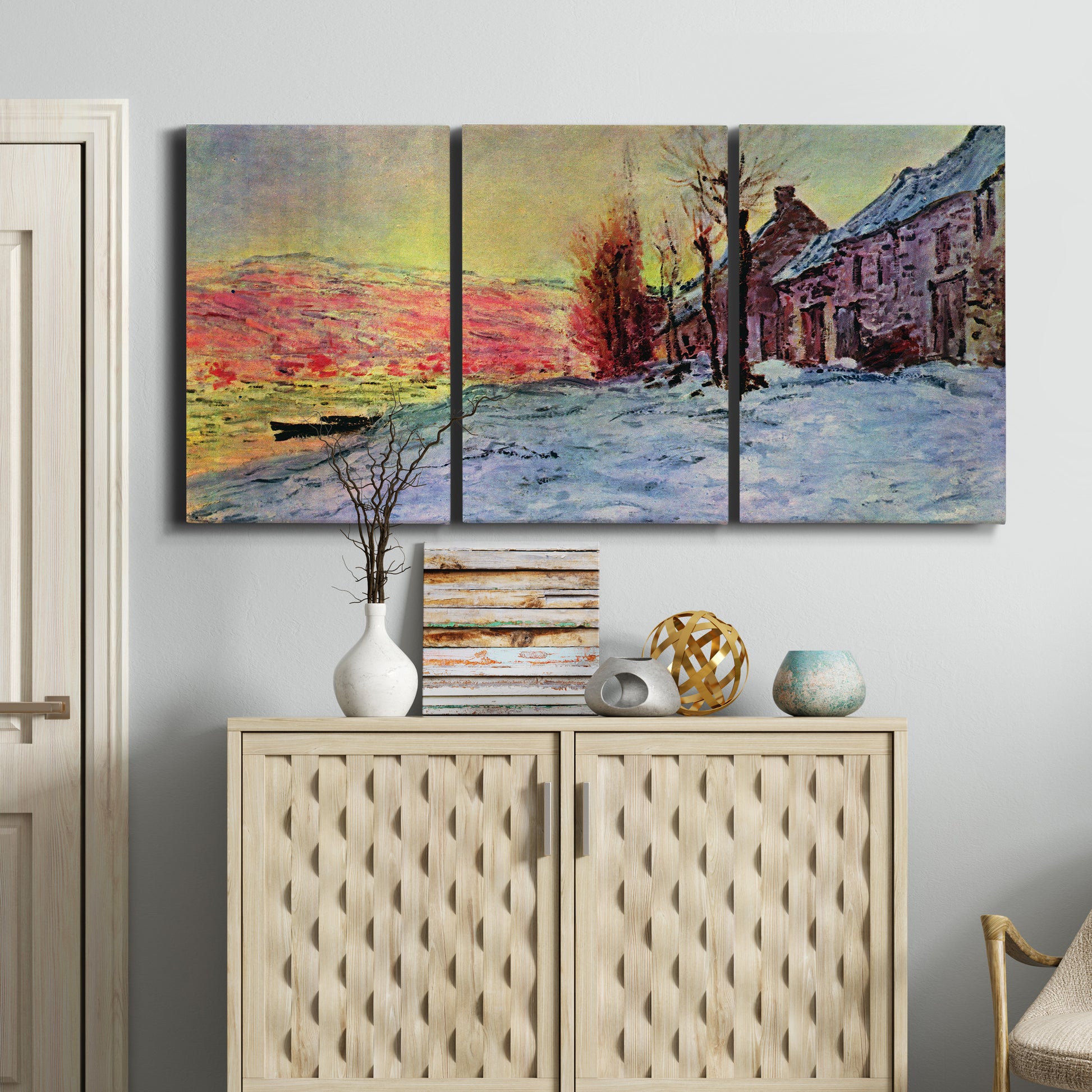 Three-panel canvas wall art featuring river view beneath cloudy sky, displayed above a cabinet in an entryway.