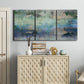 Three-panel canvas wall art featuring cool dreamy abstraction, displayed above a cabinet in an entryway.