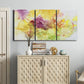 Three-panel canvas wall art featuring abstract floral rhythm composition, displayed above a cabinet in an entryway.