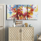 Three-panel canvas wall art featuring bright abstract summer palette, displayed above a cabinet in an entryway.