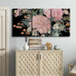 Three-panel canvas wall art featuring dark floral night blossoms, displayed above a cabinet in an entryway.